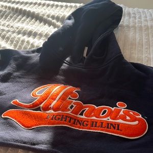 Dark kinda blue with orange lettering